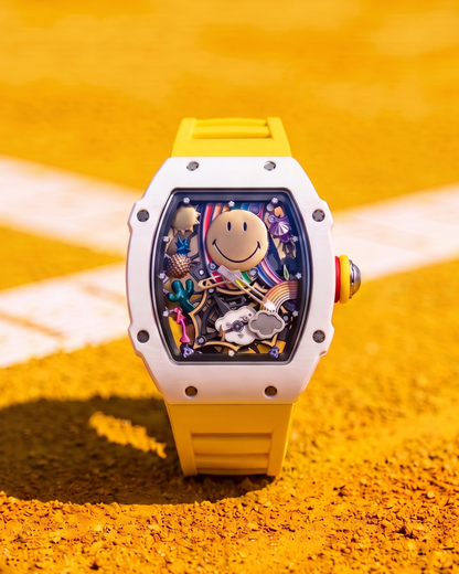 Luxury yellow tonneau-shaped watch with a colorful smiley face and whimsical art on the dial.